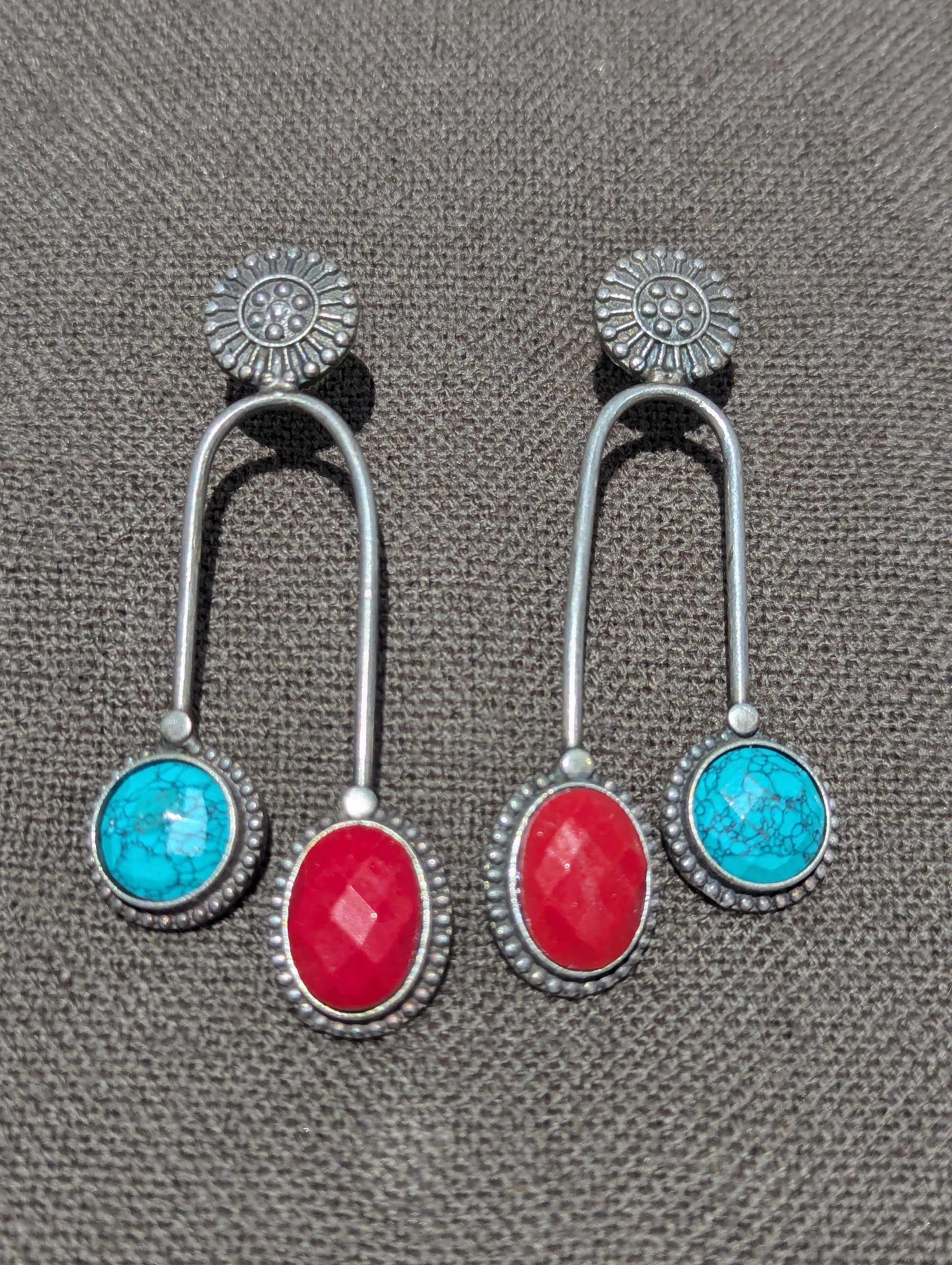 Beautifully ornate Oxidized Silver Dangle Earrings with dual opposing stones- turquoise and fiery red stones. Great nouveau vintage piece which can be worn casually or, for special occassions. 